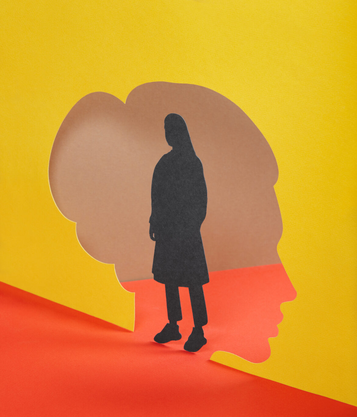 Paper craft illustration of female silhouette