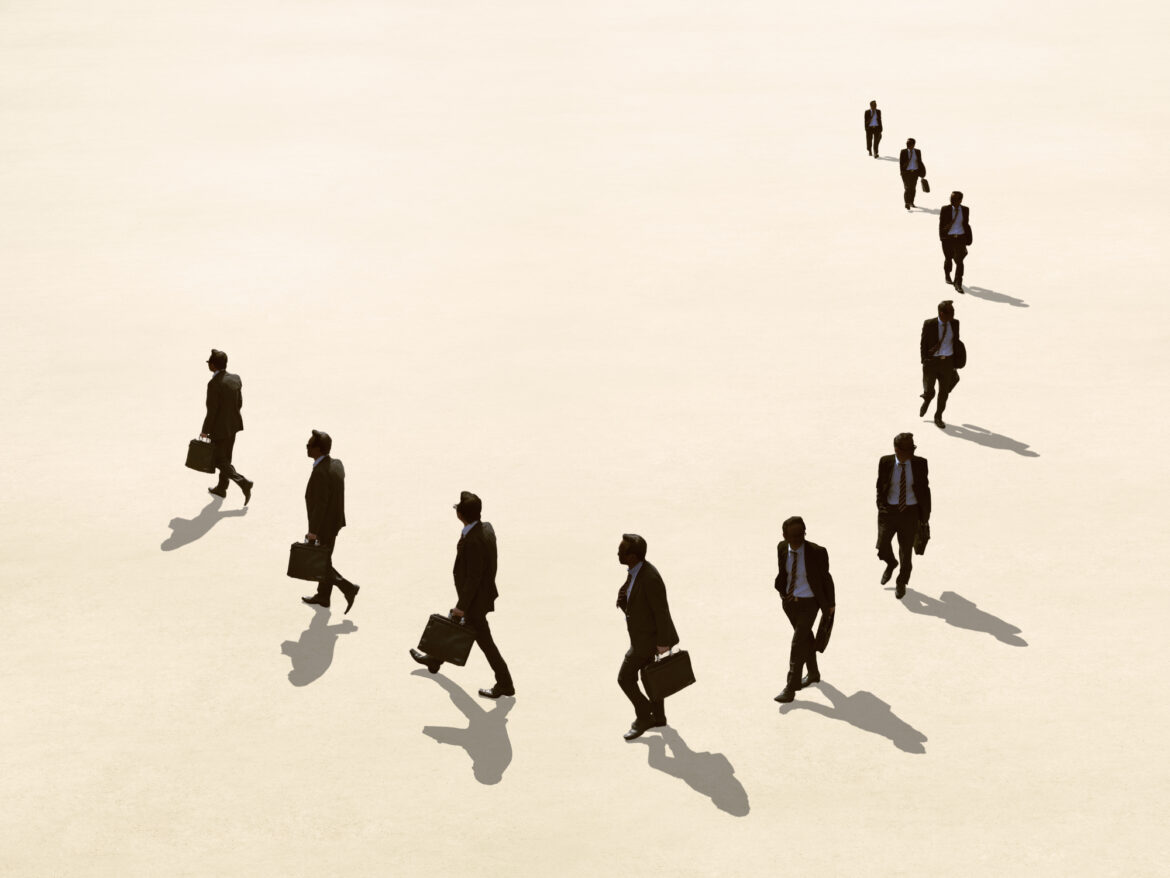 Businessman walking in circle