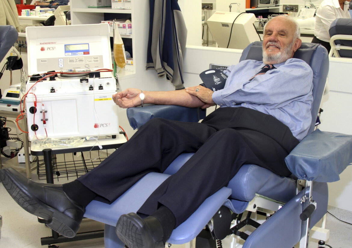 James Harrison giving blood at a donation center in Sydney in May, 2011.
