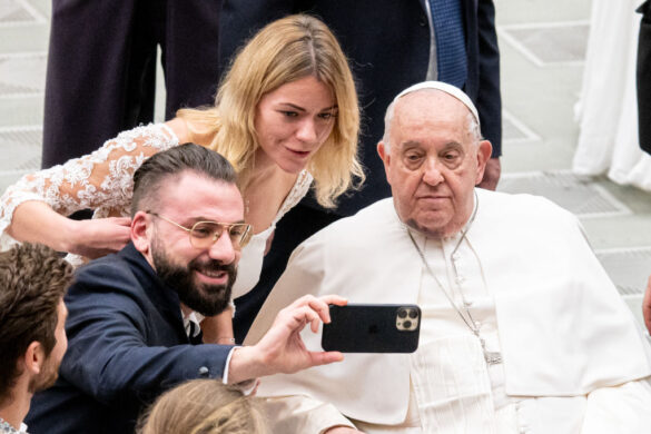 Pope Francis takes a selfie during his weekly general audience