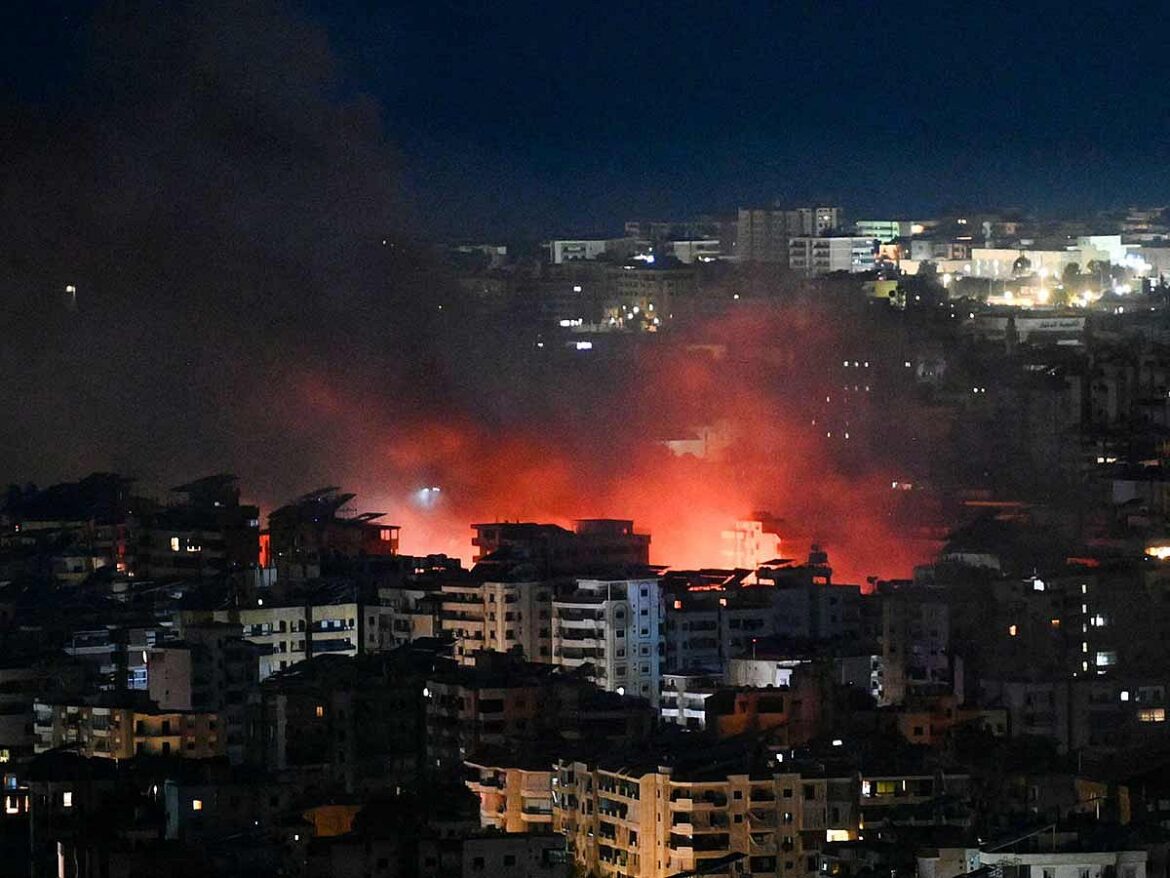 Fire rises from the site of an Israeli airstrike in the southern suburbs of Beirut 