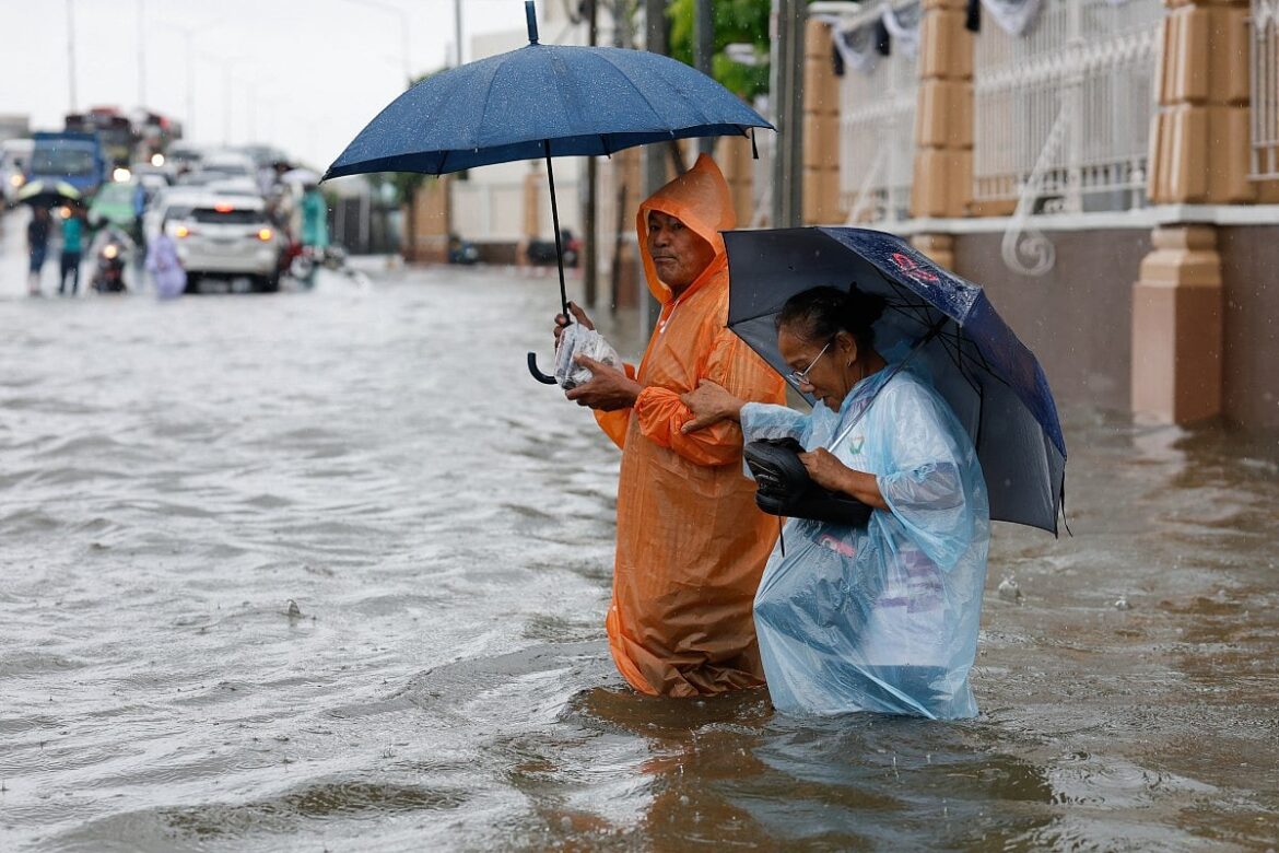 Canals full, roads submerged as Bangkok declares flood disaster