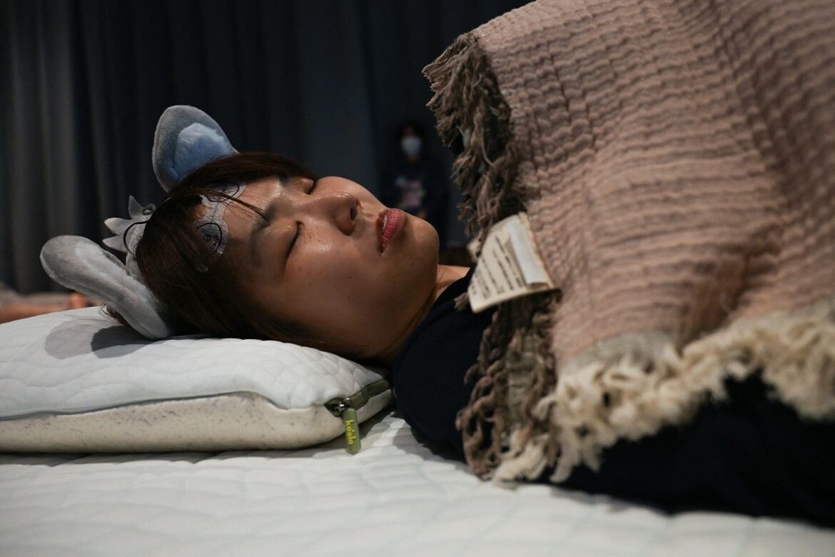 Sleep-deprived Japan turns catching the perfect nap into a competition